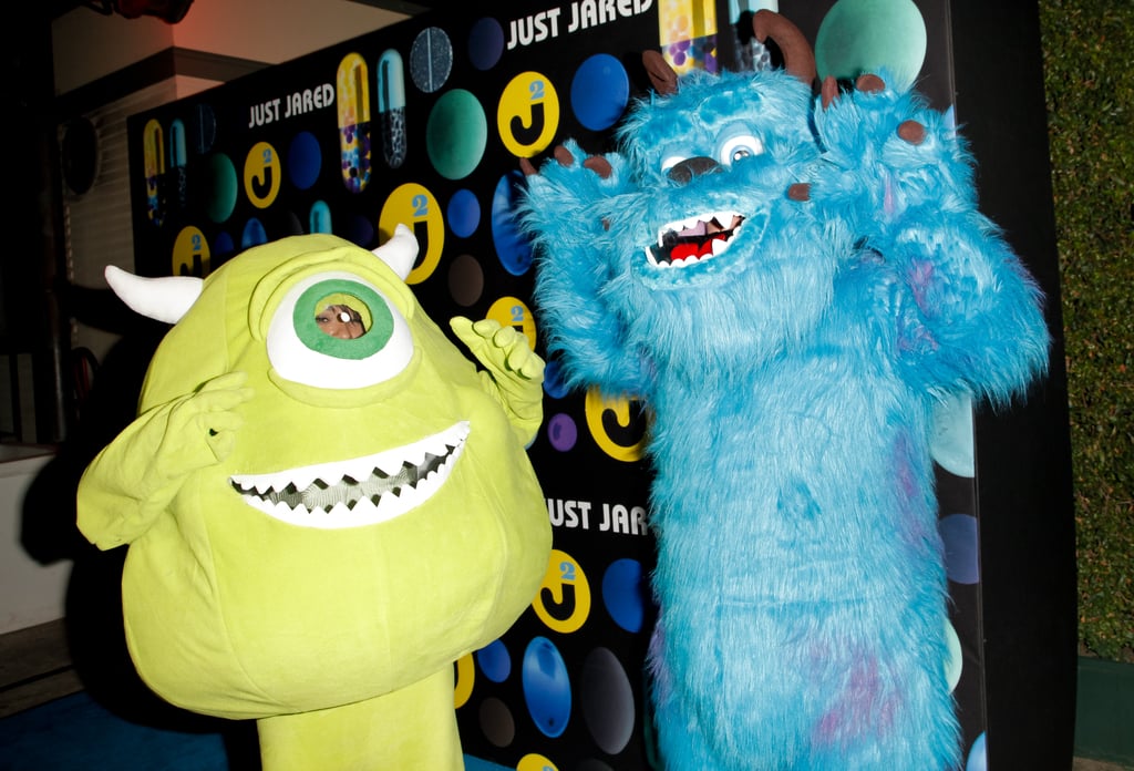 Kat Graham and a Friend as Mike and Sully