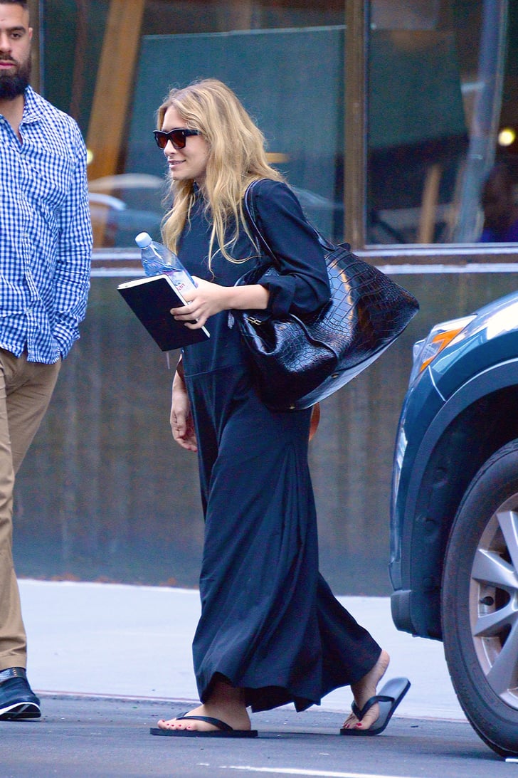 Ashley Olsen in Black Flip-Flops and Maxi Dress July 2018