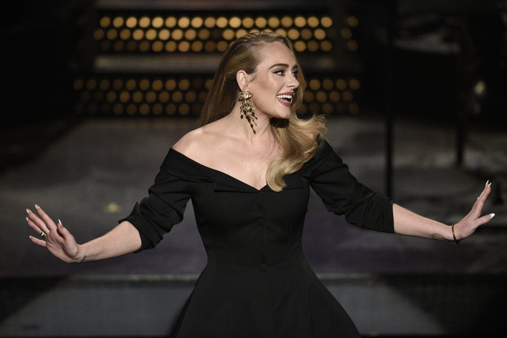It should come as no surprise that Adele stepped out in style as the host of Saturday Night Live on Oct. 24. The singer kicked off the episode with a charming monologue while stunning in an outfit from Brock Collection. The all-black ensemble featured a Giacca Rohtak off-the-shoulder peplum top from the brand's fall 2020 line, fitted trousers, and pumps. The look was complemented by a pair of chandelier earrings, glimmering rings, and a bracelet. 
The "Hello" songstress also wowed in a gorgeous evening dress during a hilarious skit inspired by The Bachelor. The floor-length gown incorporated mesh and embroidered floral details with shimmery embellishments. And of course, we have to address her lavish white dress in the ghostly skit with Pete Davidson. She might be playing a specter hell-bent on revenge, but those pearl adornments are heavenly. Check out Adele's standout looks from her SNL appearance ahead!

    Related:

            
            
                                    
                            

            Adele Returned to Instagram For Her Birthday, and Damn! We Were Not Ready For This Look