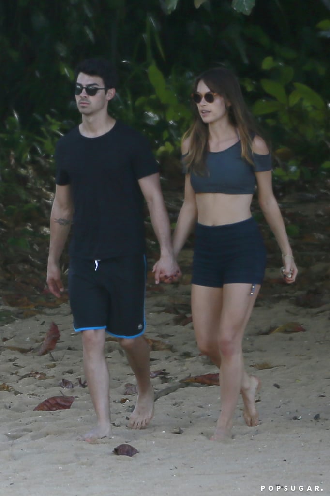 Blanda and Joe walked hand in hand.