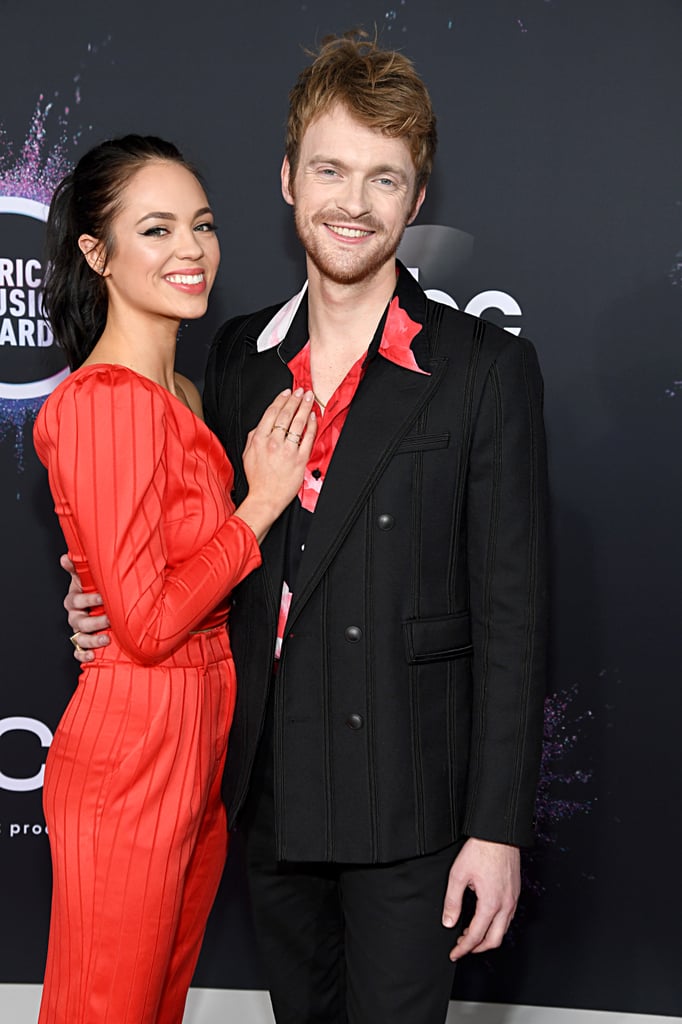Finneas O'Connell and Claudia Sulewski on the American Music Awards Red Carpet in 2019