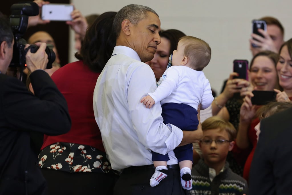 Obamas at the Marine Corps Toys For Tots Event 2014