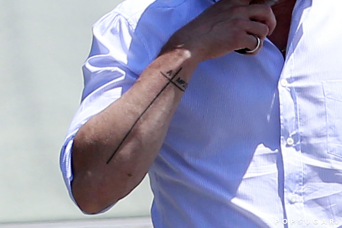 Brad Pitt Seemingly Unveils Mysterious New Tattoo Next to His Angelina  Jolie Ink  YouTube