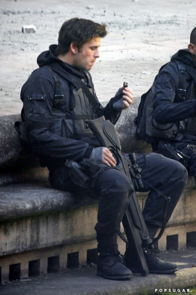 Liam Hemsworth Eating Chocolate on the Mockingjay Set