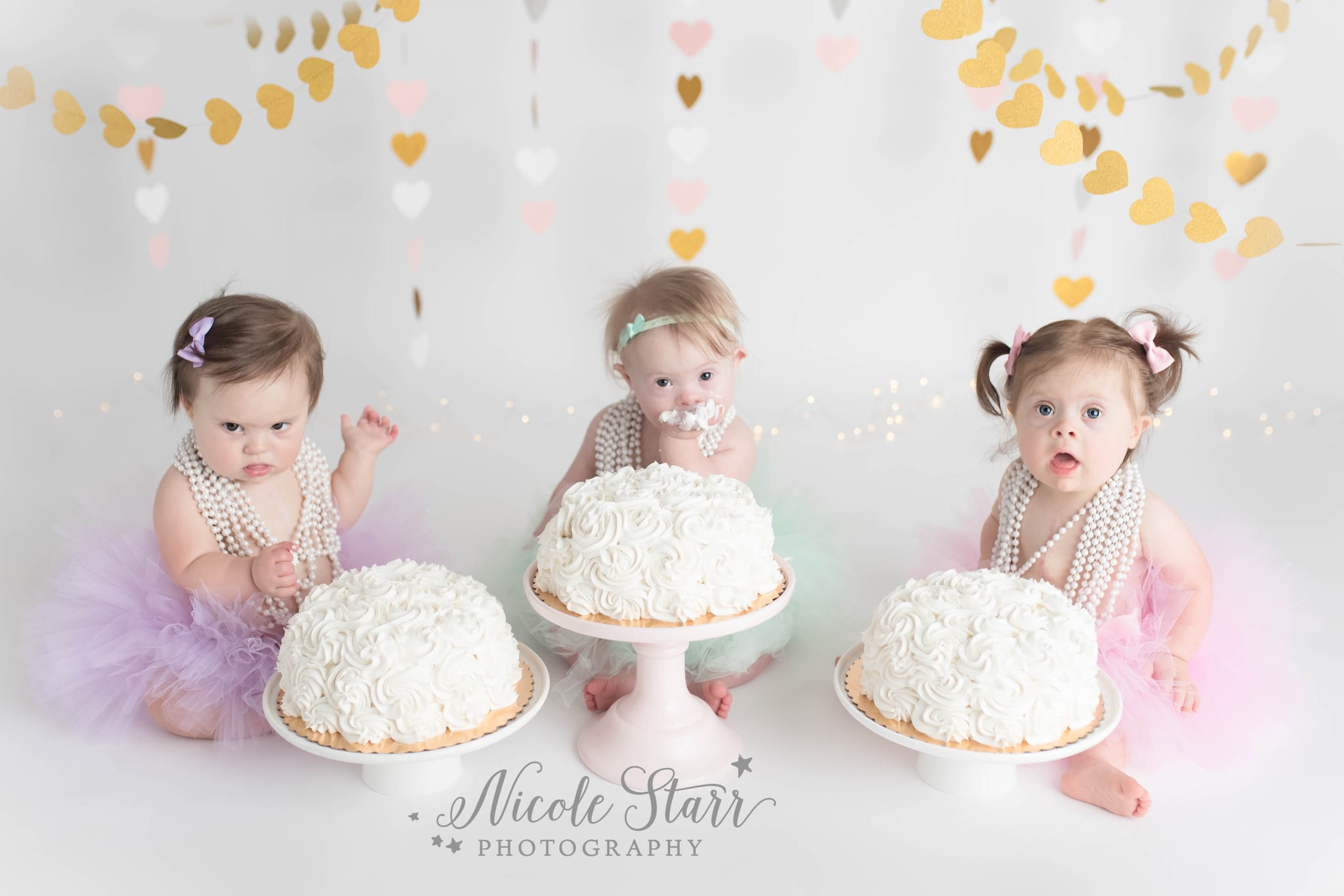 Three Of Hearts Girls With Down Syndrome Cake Smash Popsugar Family