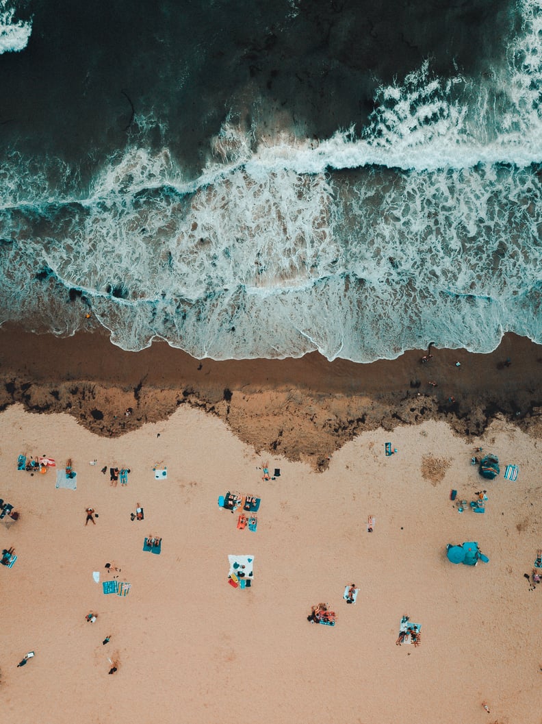 Tan together on the beach.