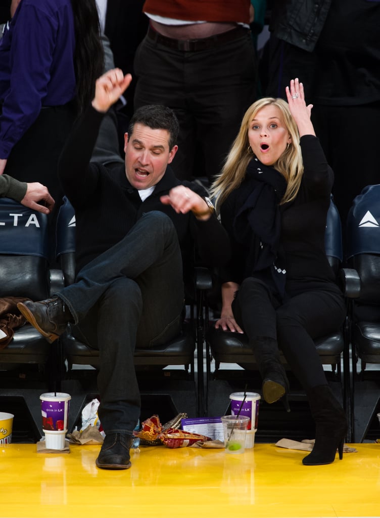 Reese Witherspoon and husband Jim Toth had major reactions to a play during an LA Lakers game in March 2013.