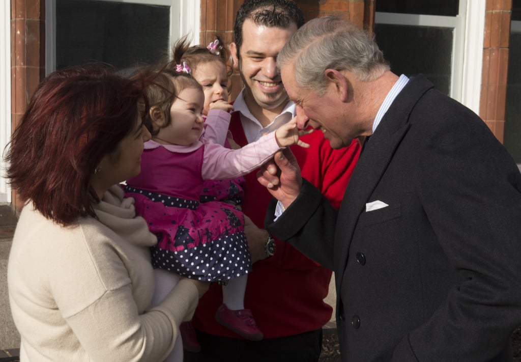 A young girl pinched Prince Charles's nose when he visited Tottenham on Wednesday.