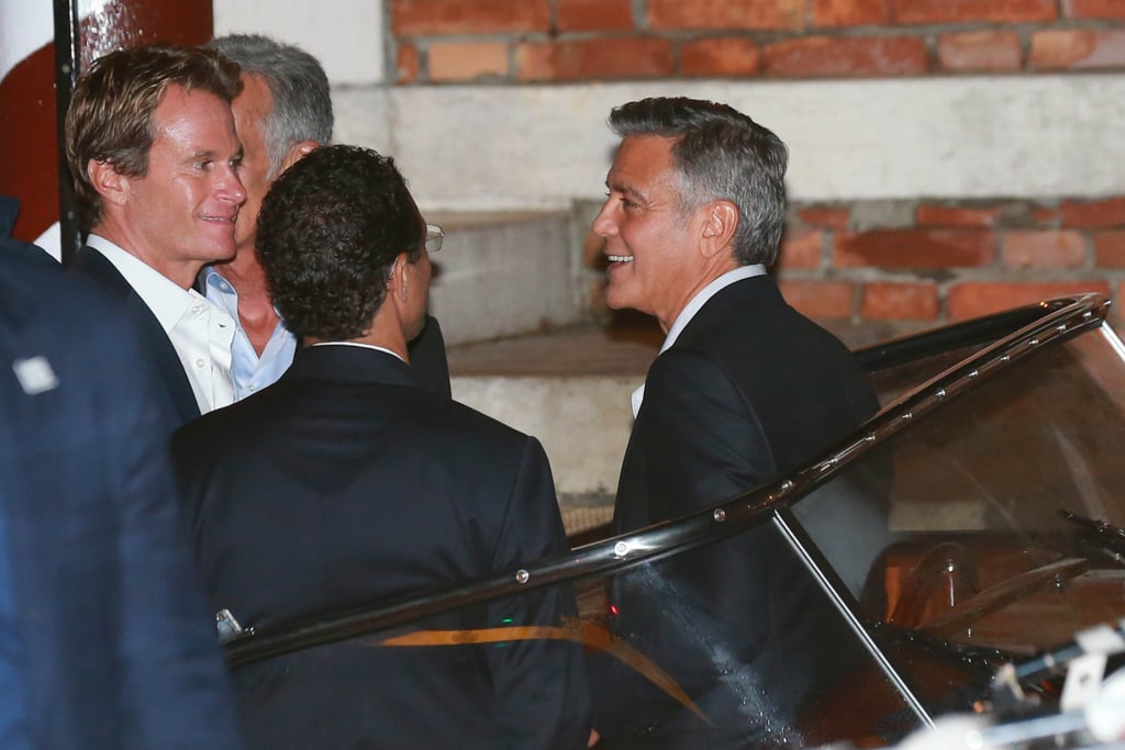 George Clooney laughed with his pals.