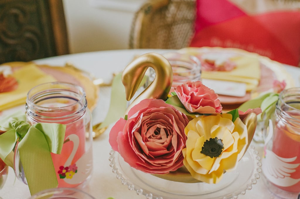 The swan centerpieces were filled with paper flowers.