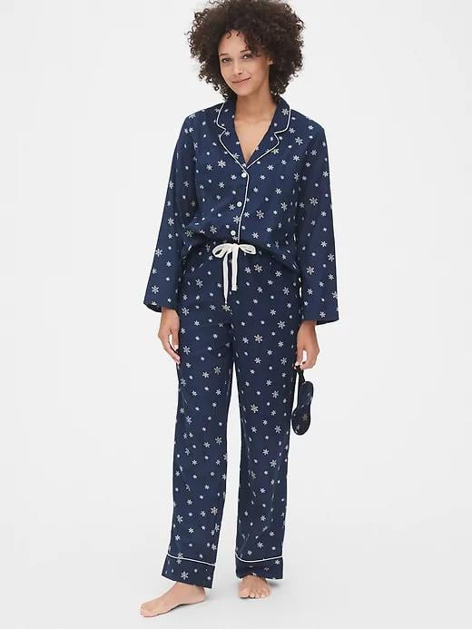 Help her channel extreme Winter vibes in this snowflake-covered Flannel Pajama Set ($70).