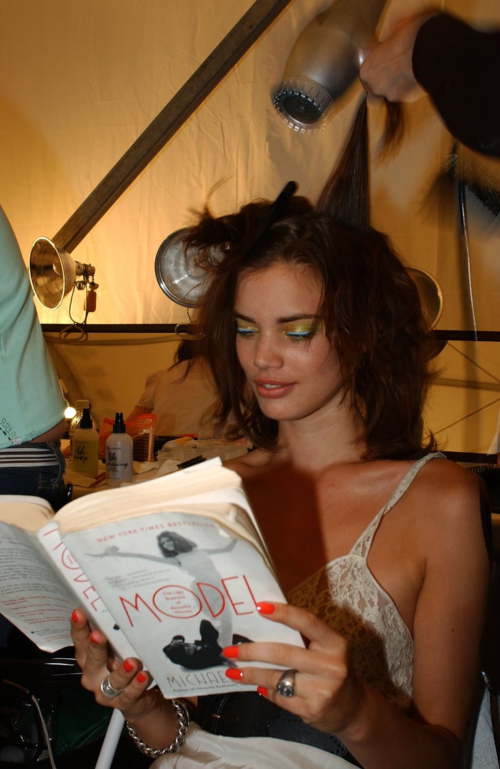A Model Read A Book About Models — Model The Ugly Business Of Models Reading Books Popsugar