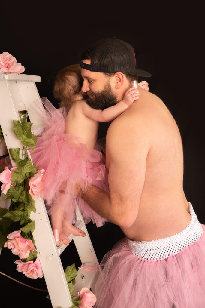 Dad and Baby Daughter Wear Matching Tutus For Photo Shoot