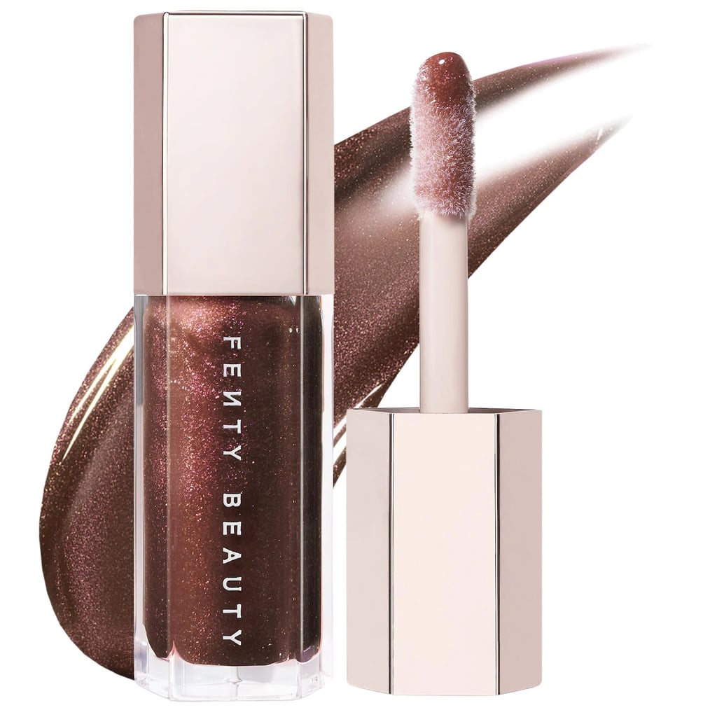 Fenty Beauty by Rihanna Gloss Bomb Universal Lip Luminizer ($22)
"Every year, I pick up several lip glosses and give them to the women in my family as stocking stuffers. Fenty Beauty's bestselling gloss is universally flattering, adds the perfect touch of shine, and has a soft peach-vanilla scent that my relatives just love." — Jessica Andrews, senior style director