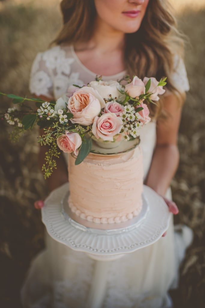 "What's not to adore about a boho-chic bride holding her enchanting cake in a field of wheat?" — Doug Weittenhiller