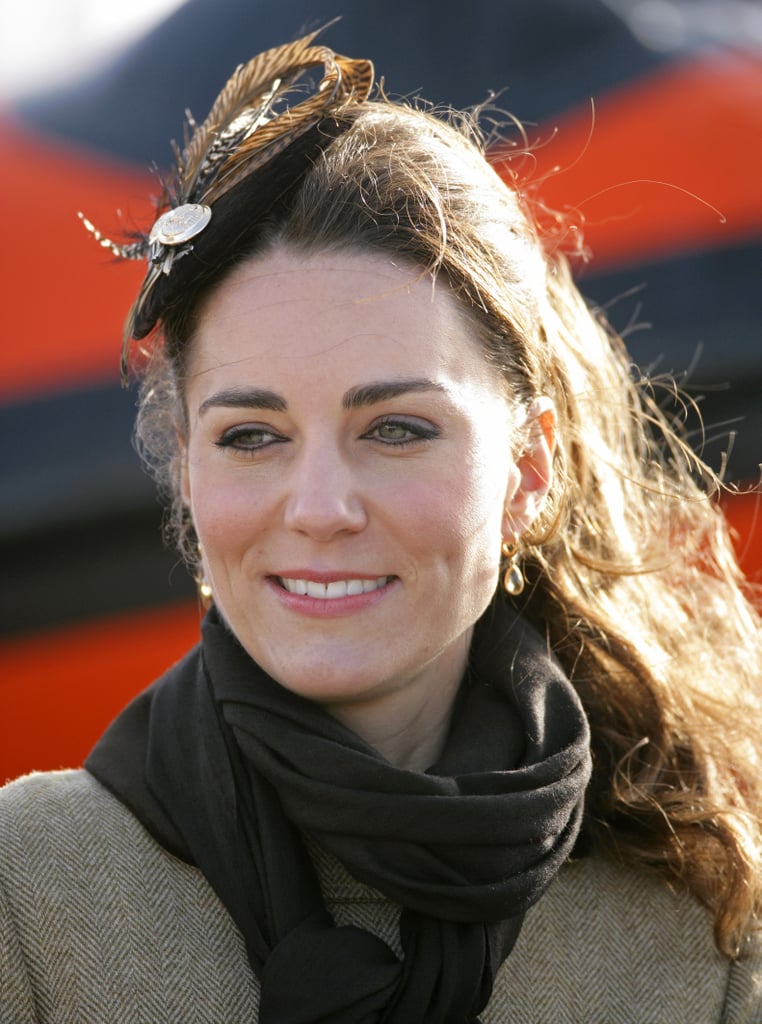 A feathered piece topped Kate's look for an event in 2011.