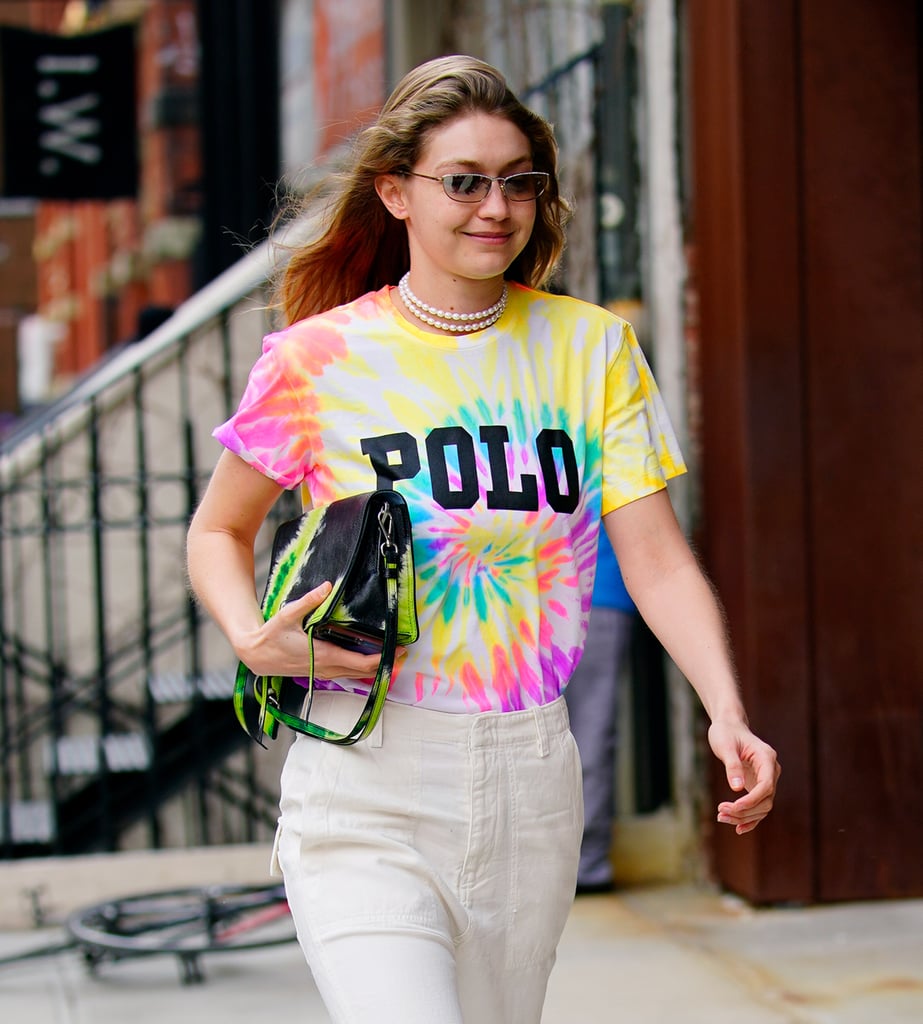 Looking to dress your favorite t-shirt? Look to Gigi Hadid. The supermodel styled her pearl choker necklace with a tie-dye Polo shirt and Prada bag.