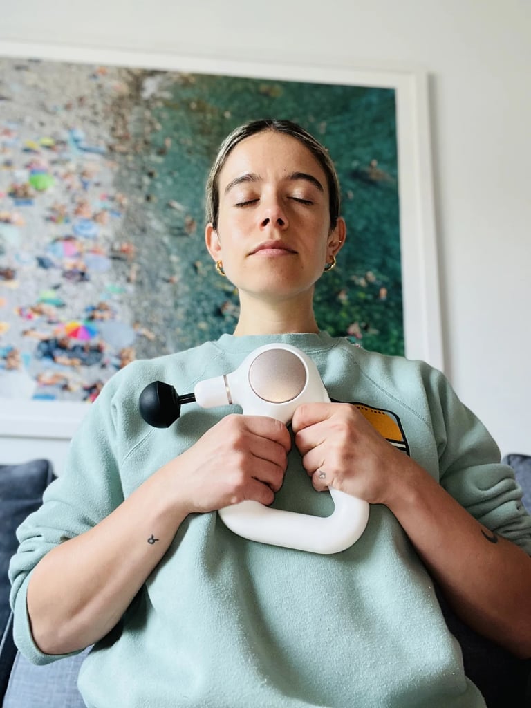 Therabody Theragun Sense ($200, originally $300)
The Theragun Sense combines traditional percussive massage with a mindfulness moment — ideal for those who want a holistic mind-body treatment. Along with area-targeted massage routines, you can access breathwork sessions via the Therabody app. Not only will you be able to relieve physical aches and pains, but also give your mind a minute to pause, reflect, and reduce stress. This massage gun has five percussive massage speeds and four attachments: Dampener, Standard Ball, Thumb, and Micro-point. It is equipped with a biometric sensor for heart rate readings that align with your breathwork sessions and an LCD screen with buttons for controls. Use code EXTRA at checkout. Check out our in-depth review of the Theragun Sense for more information. 
Editor Quote: "What makes the Therabody Theragun Sense different from all other massage guns on the market is the ability to practice breathwork through guided sessions on the app. The Sense uses vibration cues to guide you through the breathwork sessions, and will show your minimum heart rate post-session to show you how much you relaxed. The breathwork is particularly great for those of us who easily get distracted while meditating. It removes the stress of having to close your eyes and block out the rest of the world, which, personally, put me more at ease." — Sarah Wasilak, shopping director
