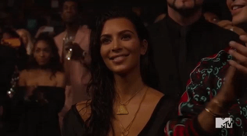 Kim Kardashian, Smiling Sweetly When Kanye West Praised Her on Stage