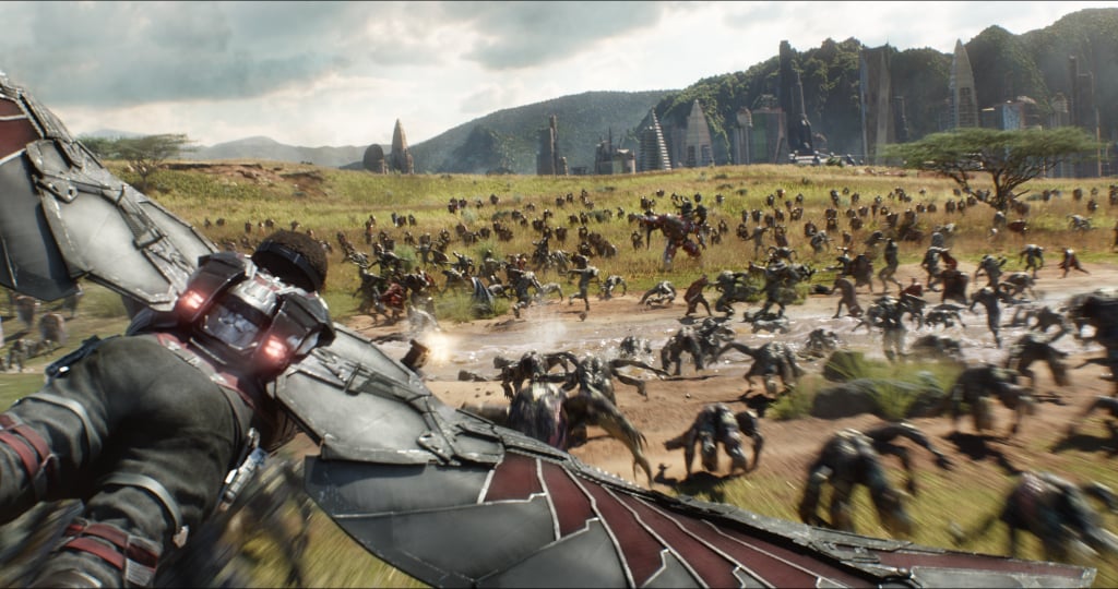 Falcon (Anthony Mackie) flies into action over a Wakanda battlefield. Those crocodile/alien-like creatures are pretty terrifying, no?