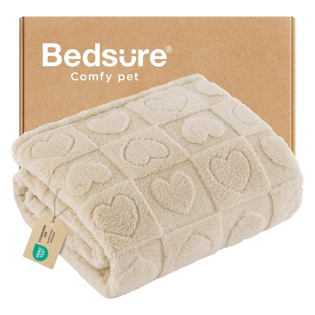 Bedsure Small Dog Blanket ($9, originally $14)
Throw blankets on every surface is a surefire sign that a chihuahua lives in your home — but even if your pup isn't a burrower like my dogs, having their own blanket can make their space cozier, and help with transitions when they need to leave the house. We keep several pet blankets on hand that we can tuck into a pet carrier or stroller for vet visits, toss in the backseat of the car on road trips, or pack in Lexie and Theo's bag when they're being boarded. It's our way of ensuring that they have a soft place to land — and the familiar scents of home — no matter where the day takes them.
