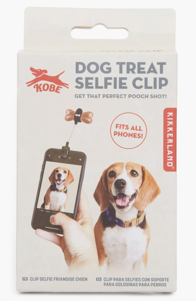 Kikkerland Dog Treat Selfie Clip ($7)
With this funny treat selfie clip, your friend will never have to worry about hassling their dog for a cute picture again. The clip-on product attaches seamlessly to a smart phone and sits just above the camera, so they'll be able to take endlessly cute pics of their pup and even treat them for their good behavior afterwards.