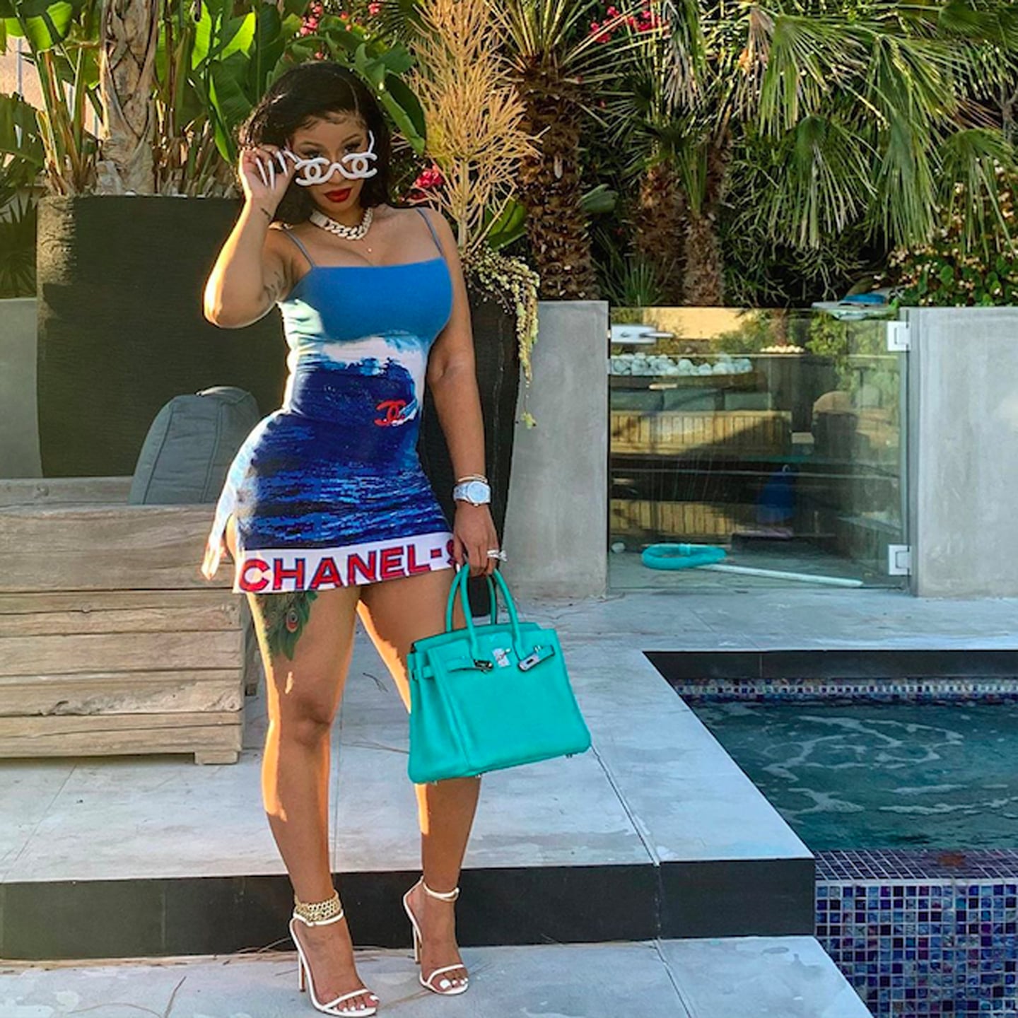 Cardi B Wearing Vintage Chanel and a Tiffany Blue Birkin Bag