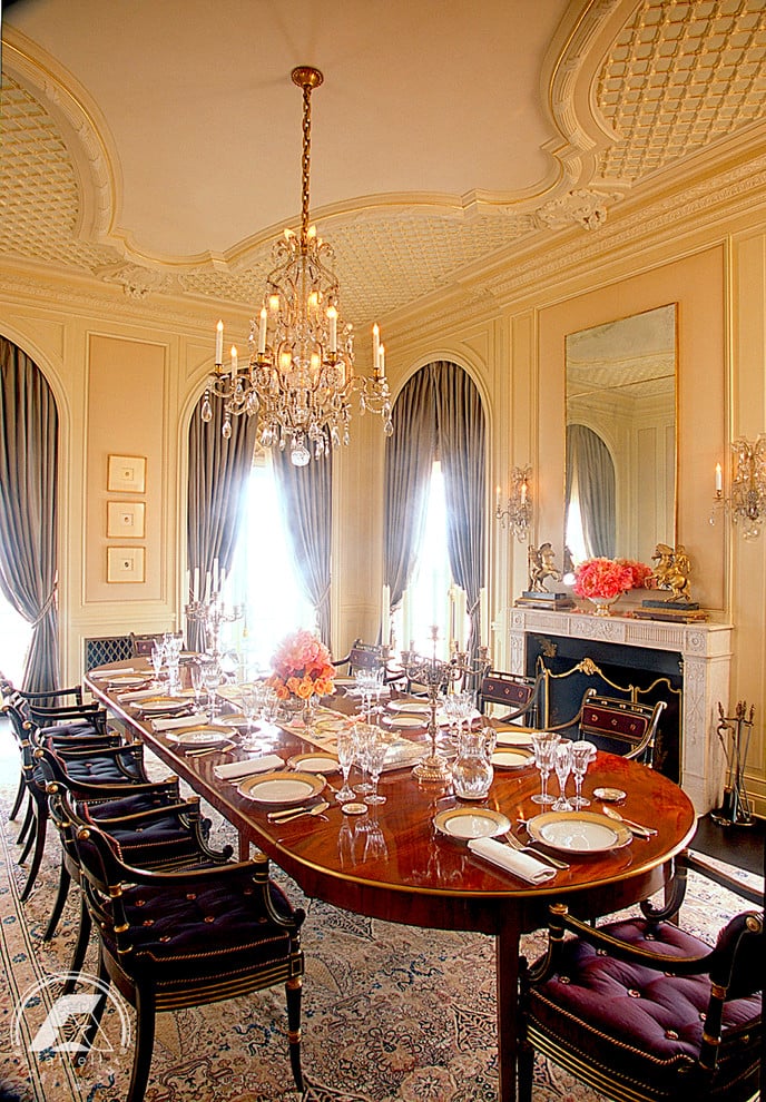 This traditional dining room feels grand enough to host heads of San