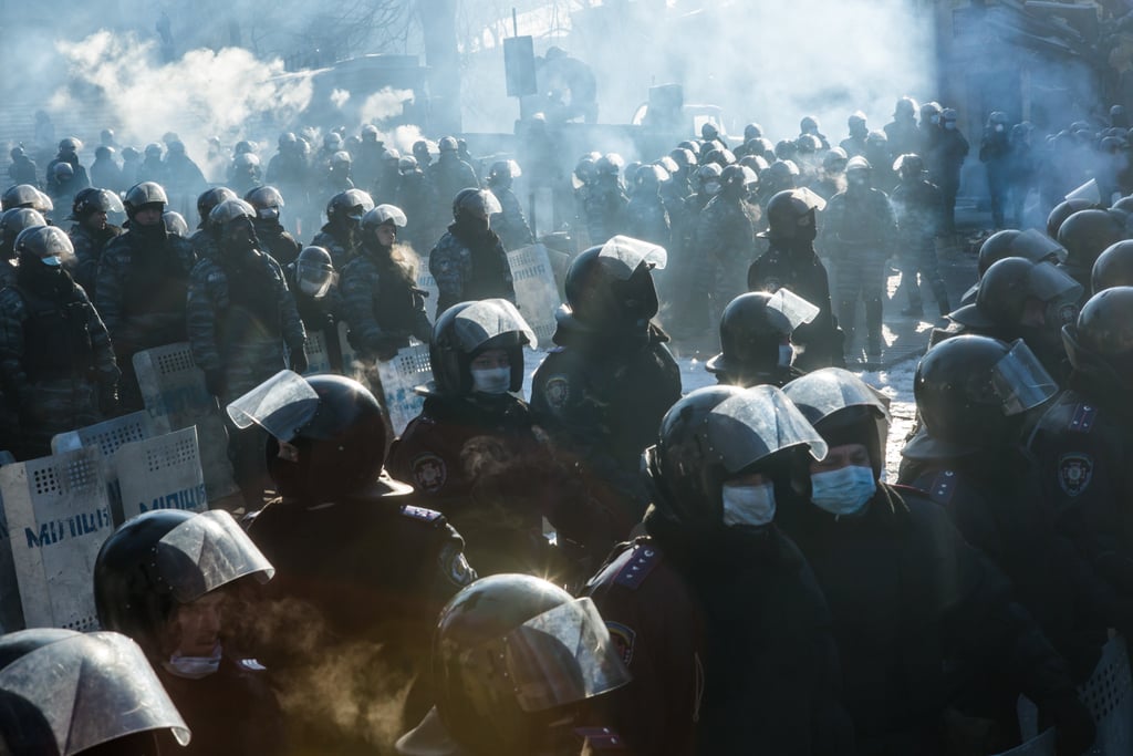 Meanwhile, police offers blocked off a street in Kiev.