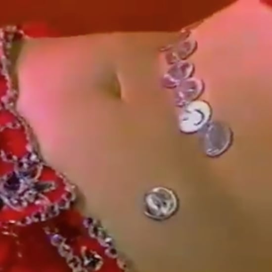 Belly Dancer Flips Quarters With Belly | Video