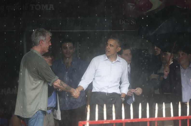 U.S. President Barack Obama shakes hands with American Chef Anthony Bourdain after visiting with him in a shopping area in Hanoi, Vietnam, Tuesday, May 24, 2016. President Barack Obama taped the second part of an interview with CNN personality Anthony Bou