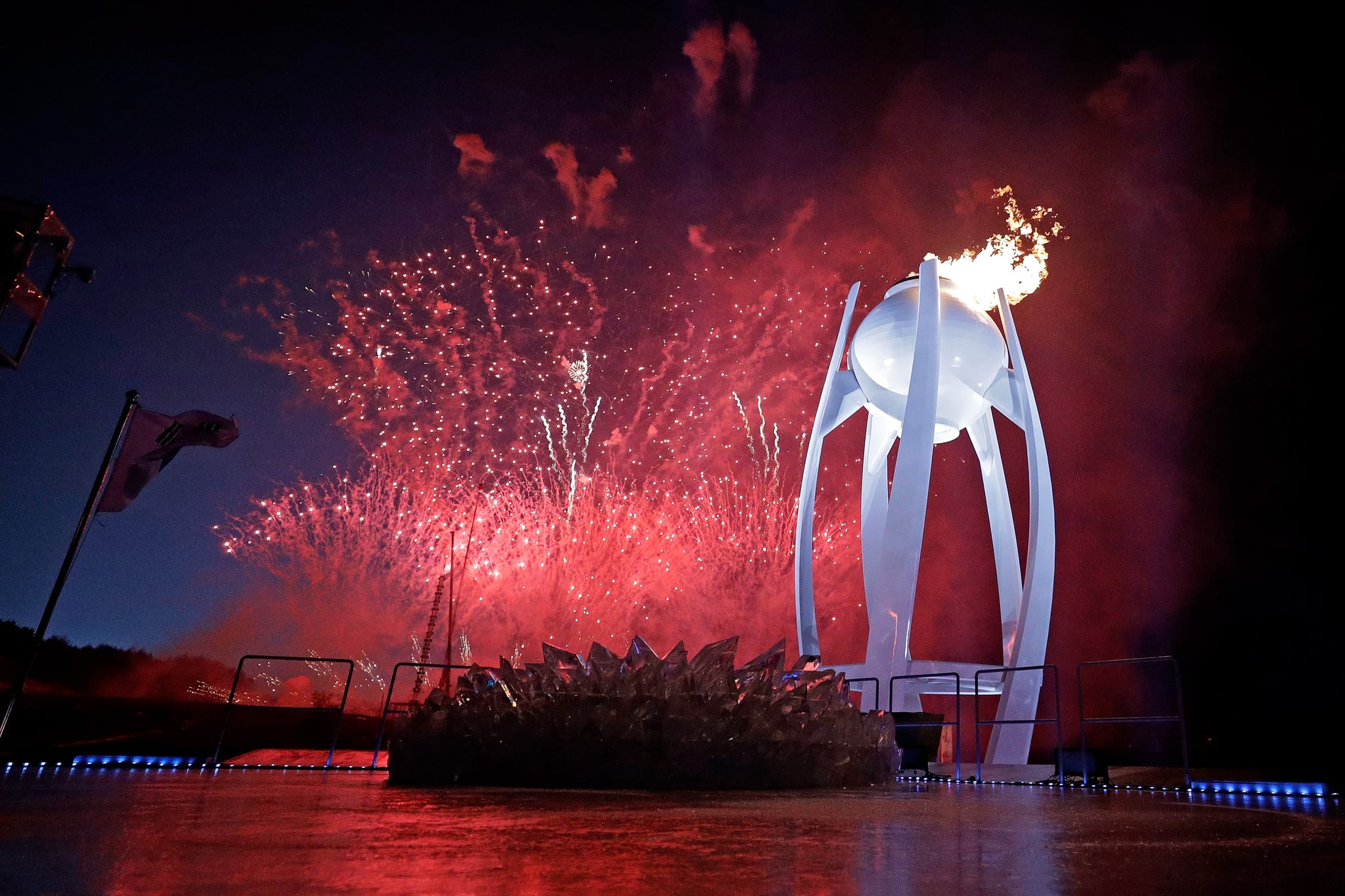 PYEONGCHANG-GUN, SOUTH KOREA - FEBRUARY 09:  Fireworks erupt as the Olympic Cauldron is lit during the Opening Ceremony of the PyeongChang 2018 Winter Olympic Games at PyeongChang Olympic Stadium on February 9, 2018 in Pyeongchang-gun, South Korea.  (Photo by Pool - David J. Phillip/Getty Images)