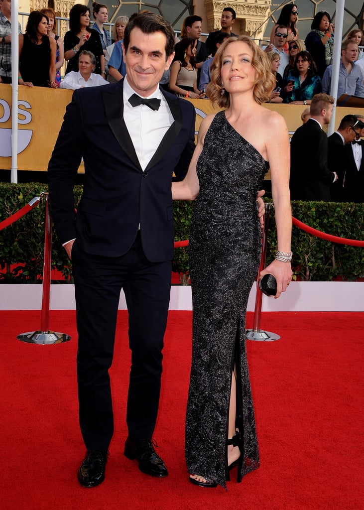 Ty Burrell and his wife, Holly, hit the carpet.