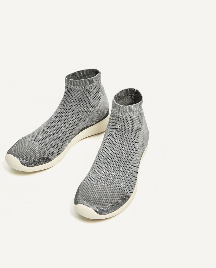 Slip into Zara's Shiny Sock Sneakers ($70) for a quick on-the-go look ...