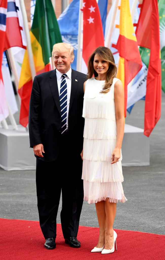 Melania wore a fringed Michael Kors Collection dress and Christian Louboutin pumps to a concert during the G20 Summit in July 2017.
