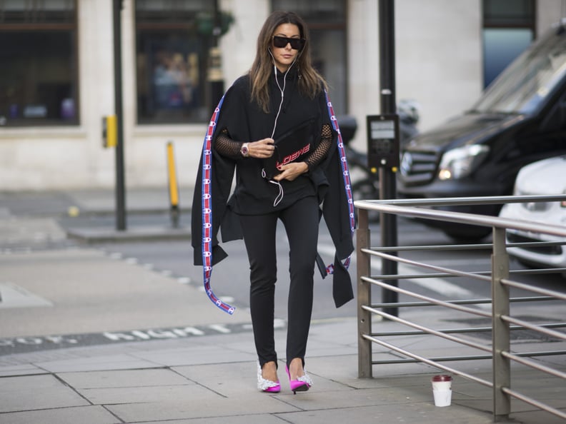 In a stirrup style with pumps and an of-the-moment sweatshirt.