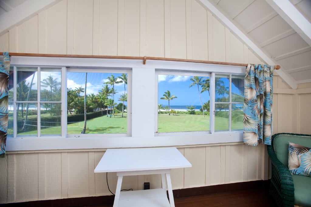 The home's large windows let in stunning views of the shore.