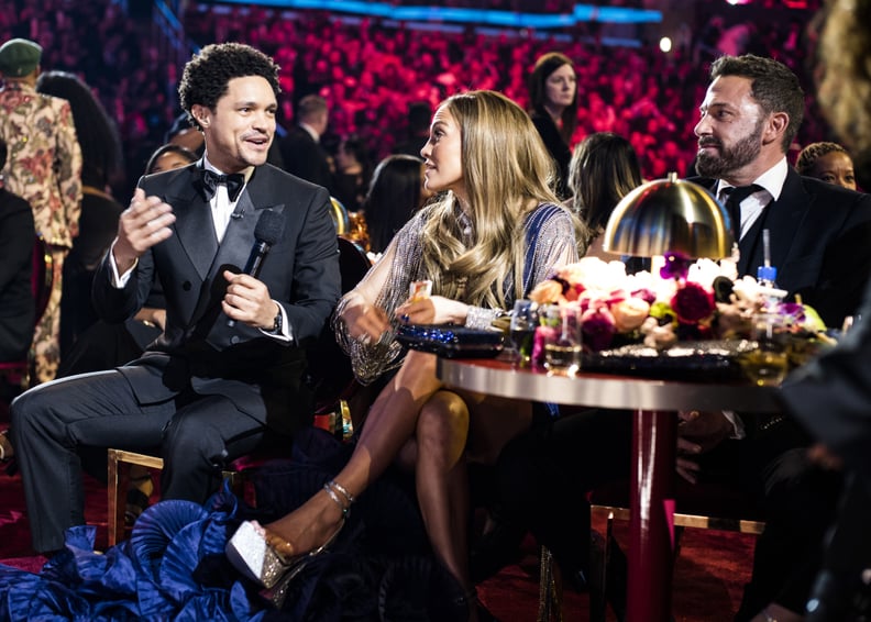 LOS ANGELES, CALIFORNIA - FEBRUARY 05: (L-R) Trevor Noah, Jennifer Lopez and Ben Affleck seen during the 65th GRAMMY Awards at Crypto.com Arena on February 05, 2023 in Los Angeles, California. (Photo by John Shearer/Getty Images for The Recording Academy)