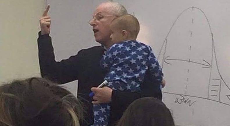 The Viral Photo of This Professor Teaching While Holding a Baby
