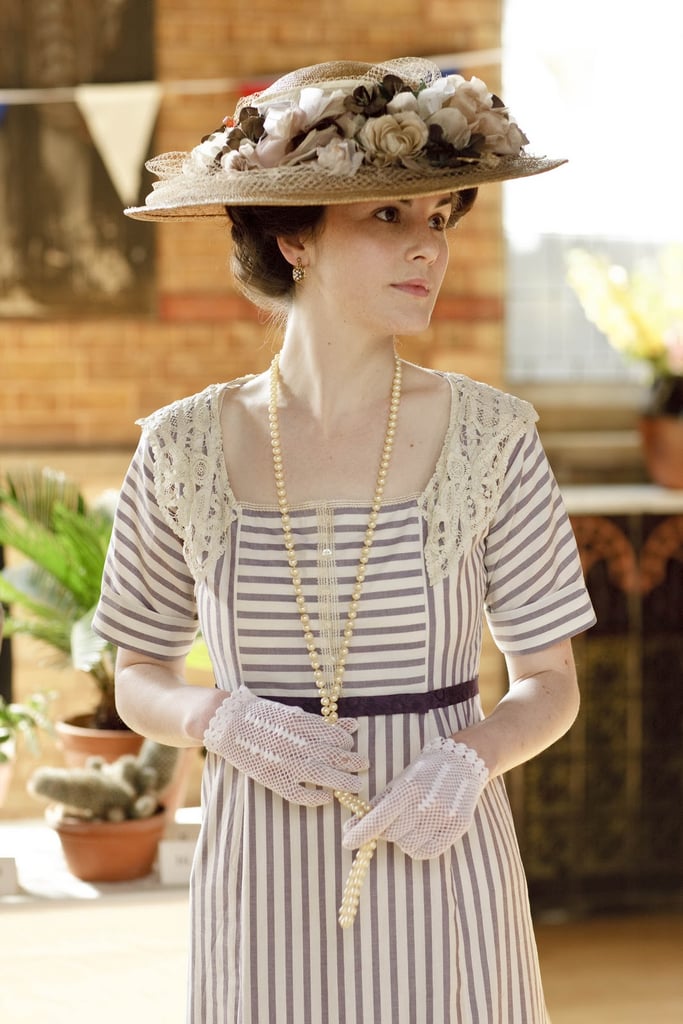 Hats, usually topped with flowers or feathers, were de rigueur during the Edwardian era. 
Source: ITV