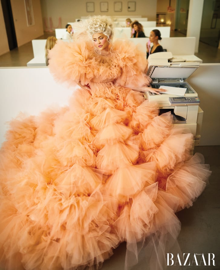 Wearing a Giambattista Valli Haute Couture gown and Buccellati earrings.