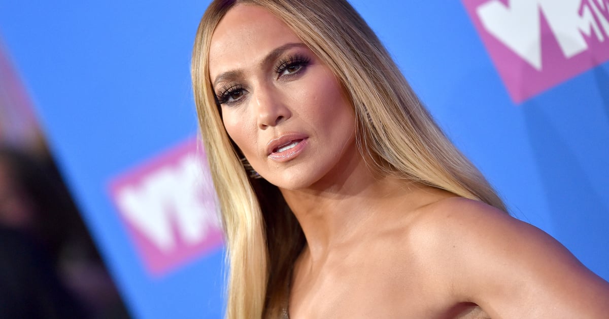 J Lo Stuns in a Plunging Gold Halter Gown at