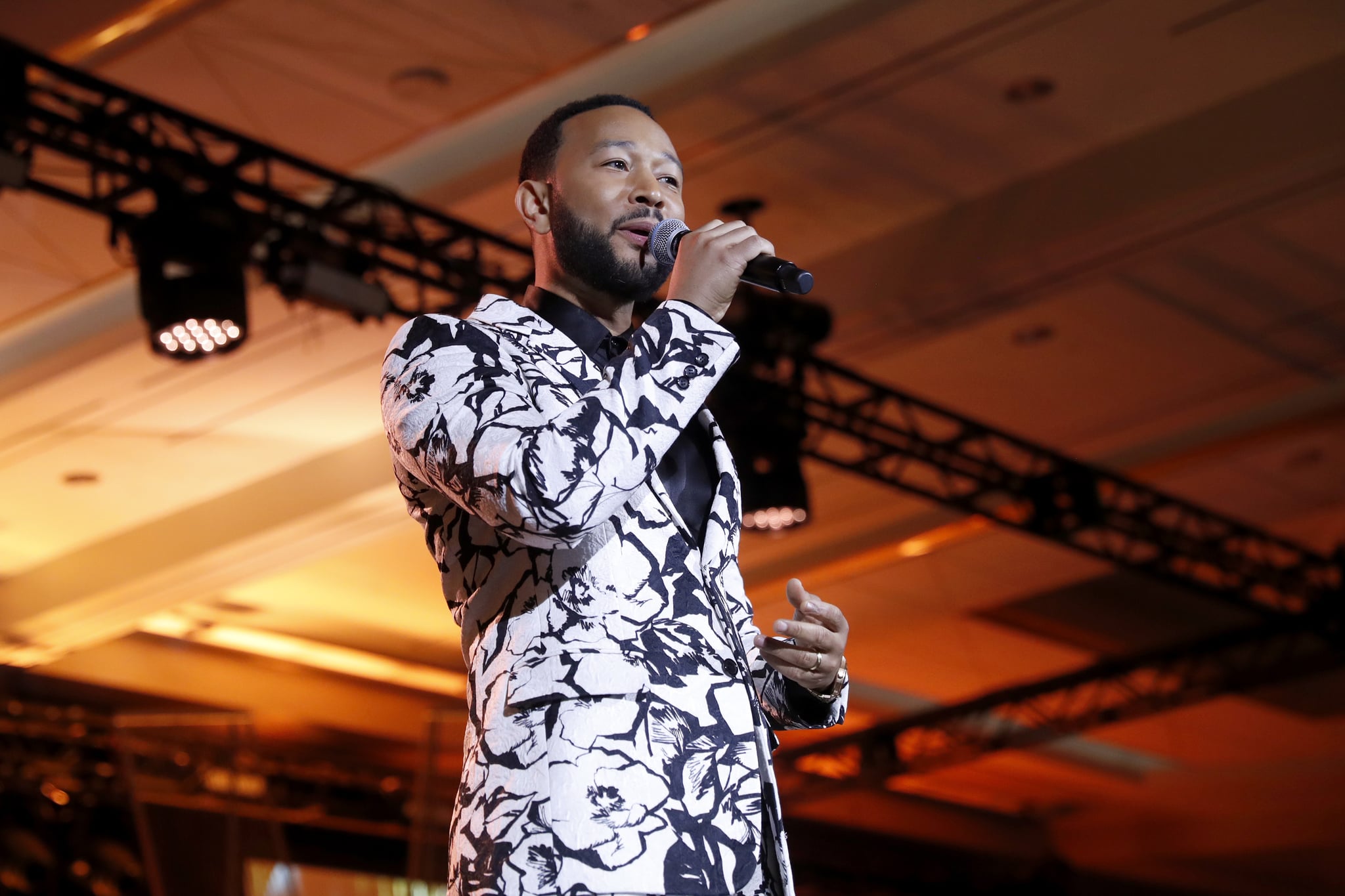 LAS VEGAS, NEVADA - APRIL 02: Honouree John Legend accepts an award onstage during the Recording Academy Honours presented by The Black Music Collective during the 64th Annual GRAMMY Awards on April 02, 2022 in Las Vegas, Nevada. (Photo by Johnny Nunez/Getty Images for The Recording Academy)