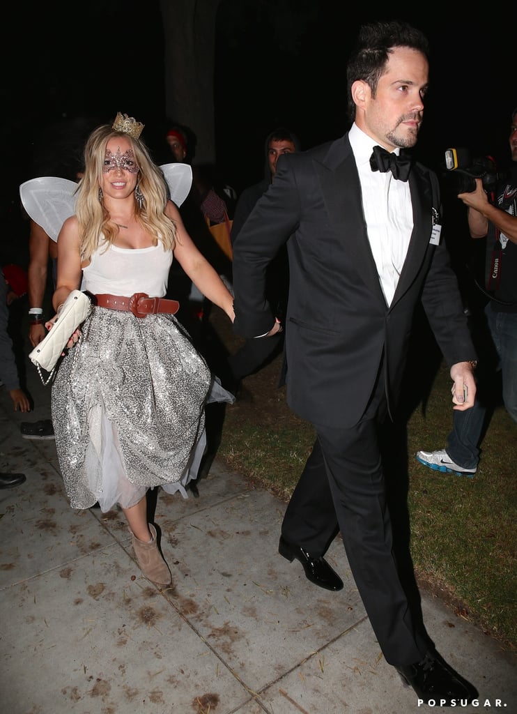 Hilary Duff and Mike Comrie got everyone talking on Friday night when they held hands while leaving the Casamigos Halloween party in West Hollywood. The pair, who announced their split back in January, looked very much together as they made their way through the crowd with Hilary dressed as a fairy and Mike dressed as an Iron Man-suit-less Tony Stark. While the couple have stated that they are separated, they have remained close in the months following their split. Hilary, Mike, and their 2-year-old son, Luca, went on vacation together in Hawaii in February, and they have been sending mixed messages about the status of their romance. Hilary has been open about the fact that her latest single, "All About You," is about her husband of four years and includes cryptic lines like "Maybe we're not meant to be together, or maybe we are."