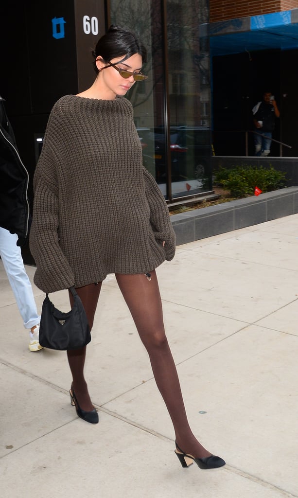 She proved brown and black absolutely go together, choosing a chocolate, chunky knit and tights to wear with black heels and bag in Brooklyn in February 2018.