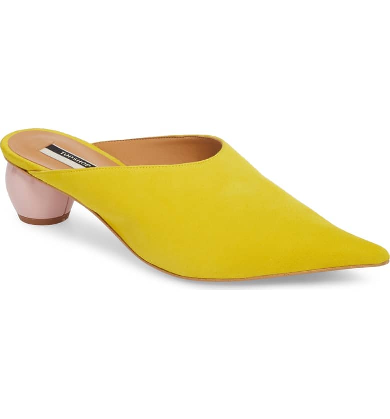 These mules ($110) take on the bright yellow trend and the geometric heel trend at once. Throw them on to dress up even the most basic of outfits.