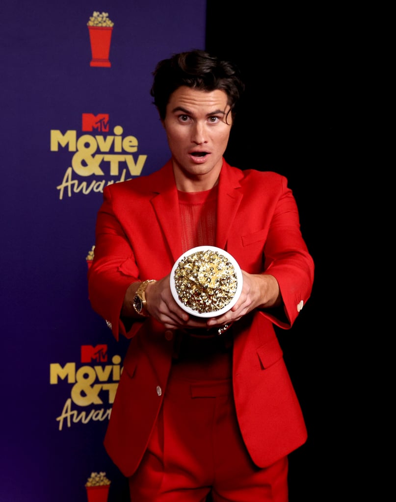 Chase Stokes Wears Red Suit With Sheer Top at the MTV Awards