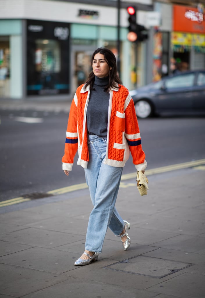 Throw an oversized cardigan on with boyfriend jeans and flats