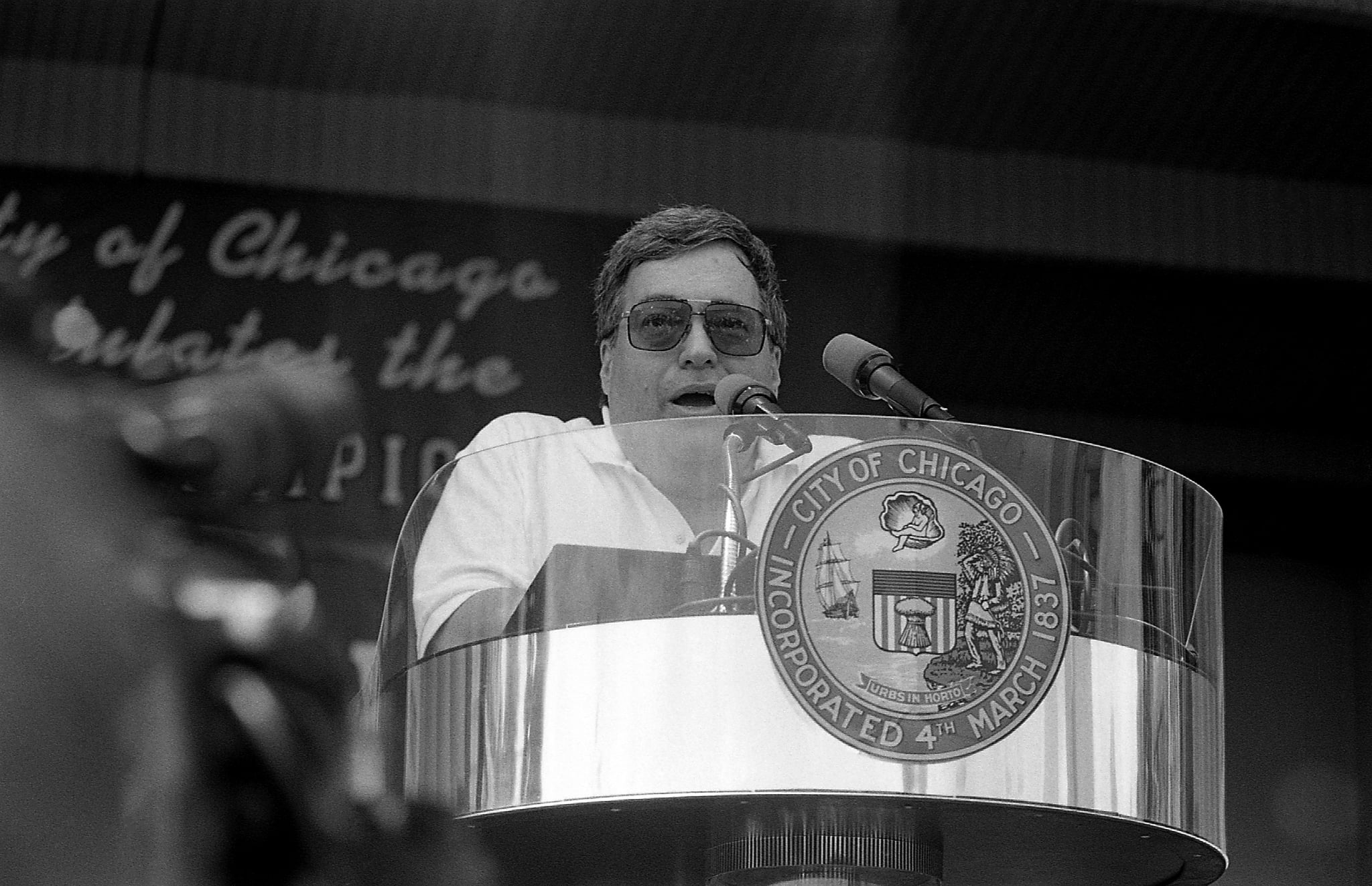 CHICAGO -  JUNE 1996:  Former Chicago Bulls General Manager Jerry Krause addresses the crowd during a celebration of the Chicago Bulls' 4th N.B.A. Championship at the Petrillo Music Shell in Chicago, Illinois in June1996.  (Photo By Raymond Boyd/Getty Images)