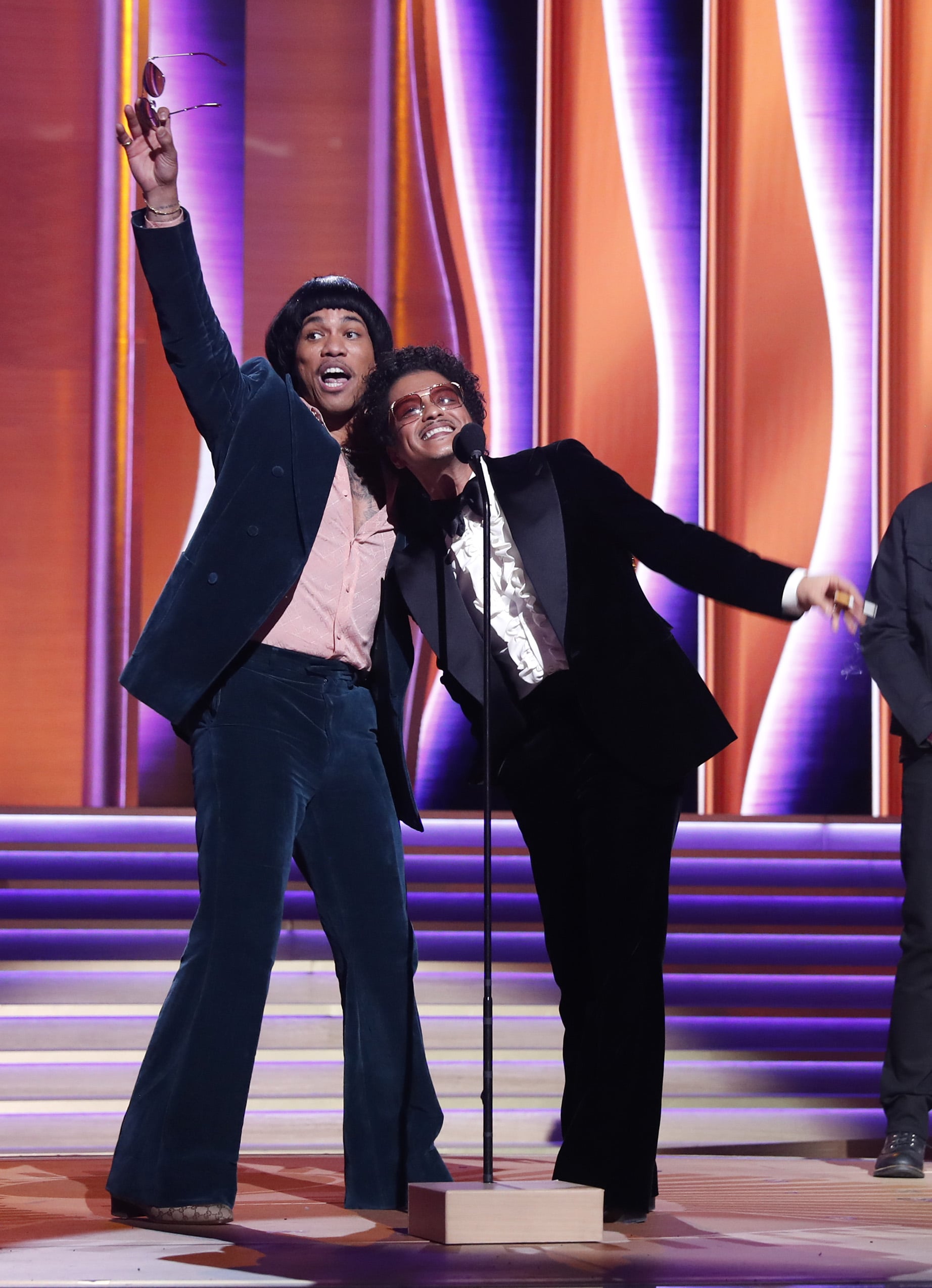 LAS VEGAS, NEVADA - APRIL 03: (L-R) Anderson .Paak and Bruno Mars of Silk Sonic accept the Record Of The Year award for 'Leave The Door Open' onstage during the 64th Annual GRAMMY Awards at MGM Grand Garden Arena on April 03, 2022 in Las Vegas, Nevada. (Photo by Johnny Nunez/Getty Images for The Recording Academy)